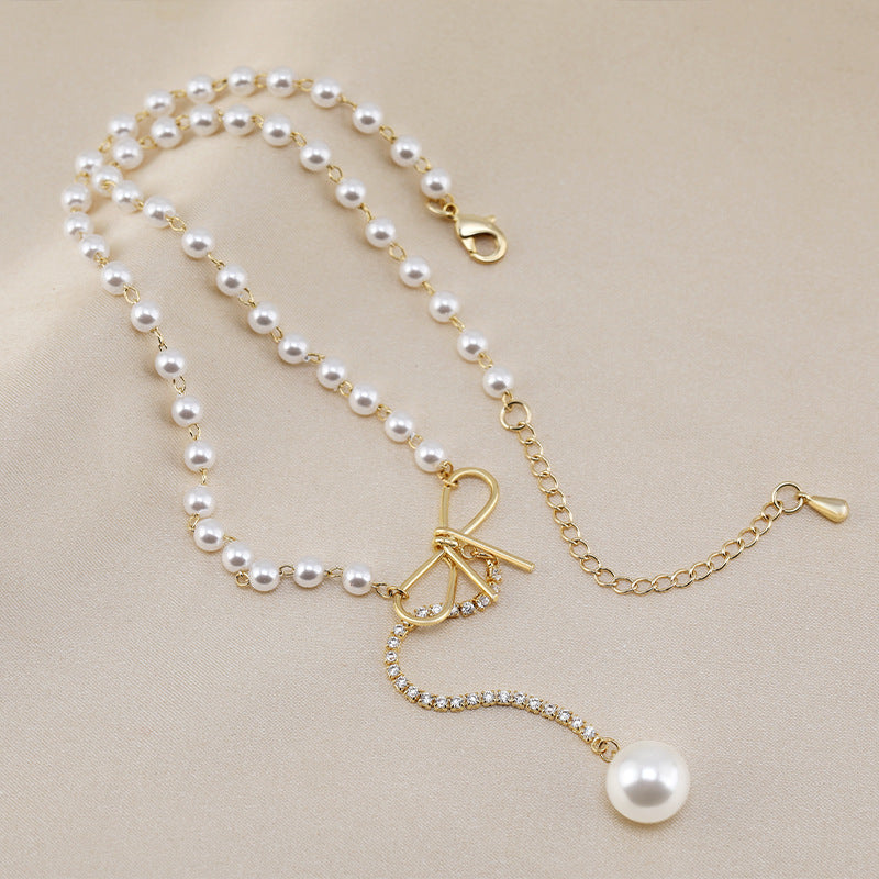 Bow design pearl necklace